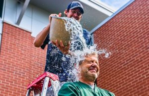 ice bucket over man's head